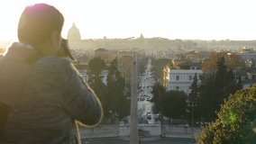 People looking at sunset in Rome, Italy, selective focus
