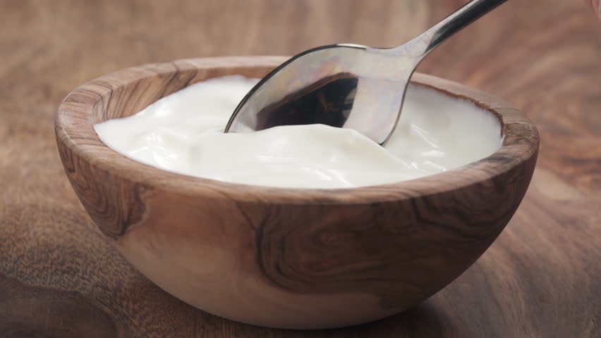 eating spoon yougurt cream wooden bowl Stock Footage Video (100% Royalty-free) 22843024 | Shutterstock