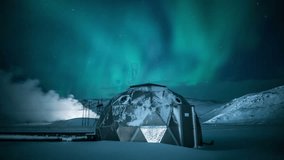 Geothermal electrical power generator metal dome night sky stars flashing aurora Iceland winter 4k - Powered by Shutterstock - Get 15% off with code: PIKWIZARD15