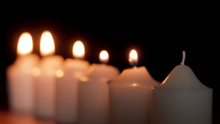Lighting votive candle