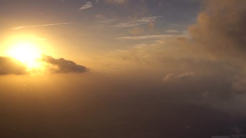Dramatic Cloud W Sun AERIAL, 4k. Features light RAYS from backlit sun.