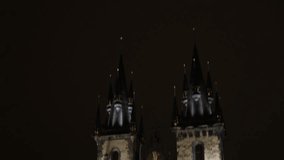 Our Lady detailed bell towers in Czechia by night slow tilt 3840X2160 UHD footage  -  Lighted Czech Republic capital Church of Mother of God before Tyn 2160p UltraHD tilting video
