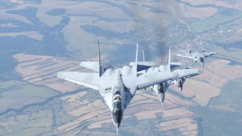 Milirary Airplanes Flight in Formation. Mikoyan Gurevich MiG-29 Fulcrum of Bulgarian and Polish Air Force Air to Air 4K Ultra HD Video.
