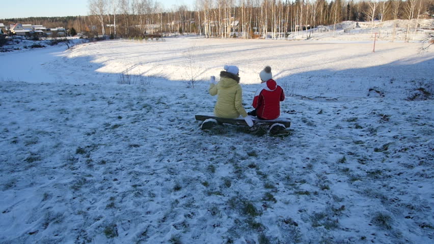Two beautiful girls in winter Park