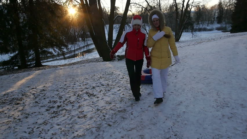 Two beautiful girls in winter Park