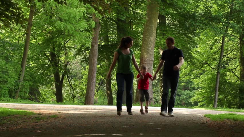 Family walk in a park