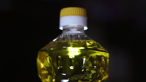 Mock up of Rotating sunflower oil bottle. Endless Looping continuous  