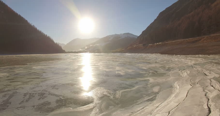 Ice chips on a frozen lake. Ice chips with sun