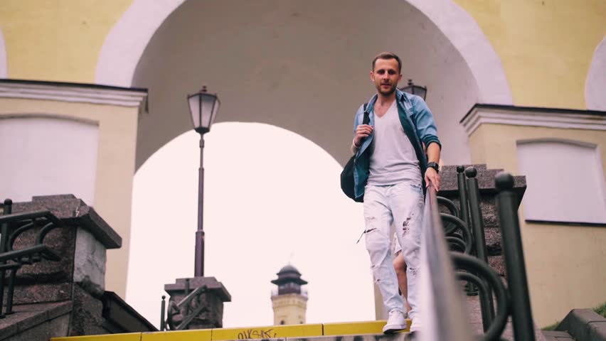 a guy goes down on the handrail