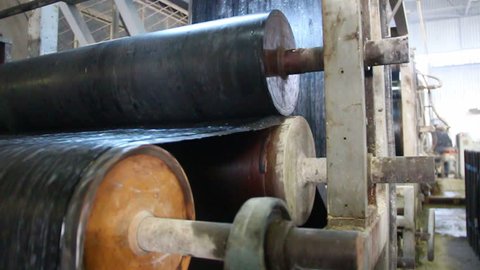 Old industrial plant engine expelling steam. Plant of eps, strofor and other products insulation