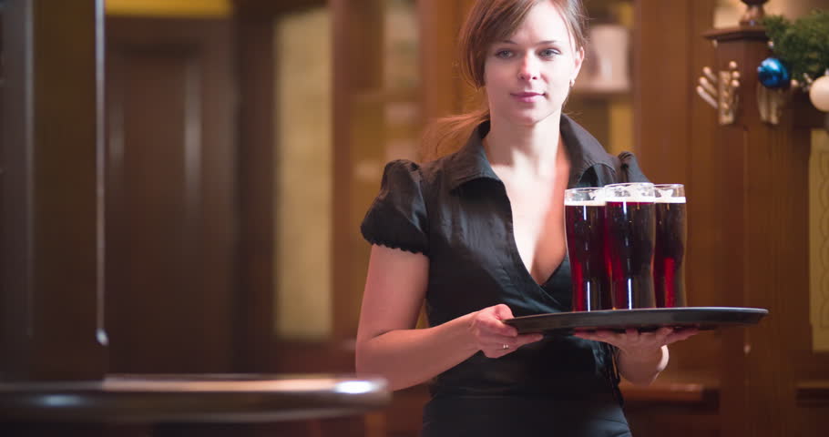 Waiter Girl Brings Beer Glasses Men Stock Footage Video (100% Royalty-free)  22920898 | Shutterstock
