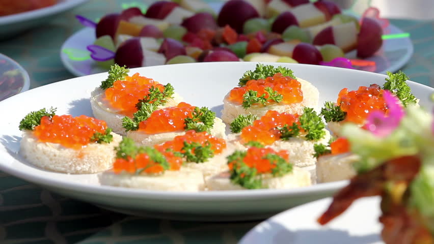 Red caviar sandwich, holiday table, buffet 