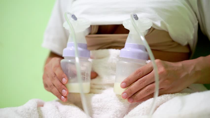 Mother Pumping Breast Milk From Stock Footage Video 100 Royalty Free 22922071 Shutterstock