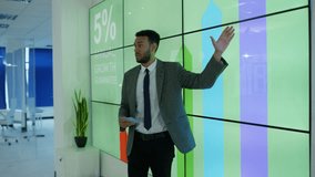 4K Businessman giving a presentation at a business conference Dec 2016-UK