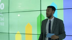 4K Businessman giving a presentation at a business conference Dec 2016-UK