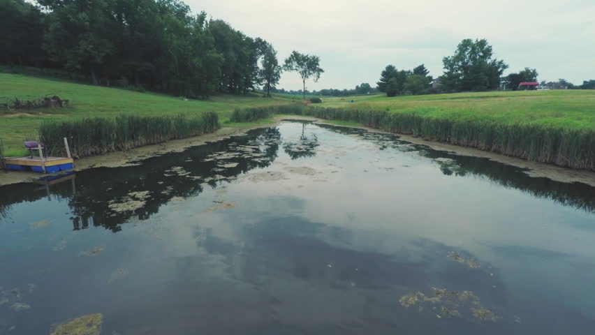aerial view of pond on farm