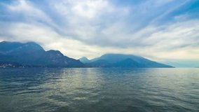 Cloudy landscape of Como Lake naer Bellagio town, Italy. Time Lapse