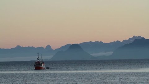 return from fishing archipelago of Lofoten Islands in Norway UNESCO World Heritage site