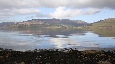 Isle of Mull Scotland UK beautiful Loch Scridain with view to Ben More and Glen More mountains on calm spring day