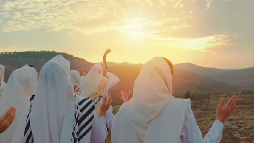 Jewish men pray With Talit and shofar in sunset Royalty-Free Stock Footage #22947178