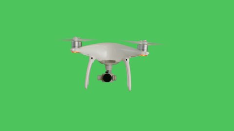 Drone with a Camera Flying. Background is Green Screen. Shot on RED Cinema Camera 4K (UHD).