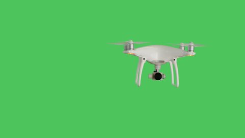 Drone with a Camera Flying. Background is Green Screen. Shot on RED Cinema Camera 4K (UHD).