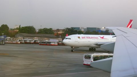 Mumbai, India: December 14, 2016: 4k footage of Air Mauritius Airplane moving at Mumbai Airport.