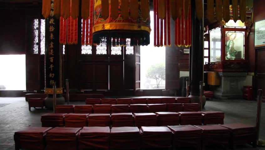 Inside chinese buddhist temple and smoke in monastery, Puto Shan, China