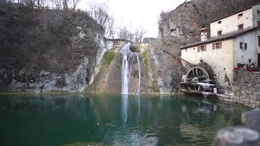 mill with waterfall