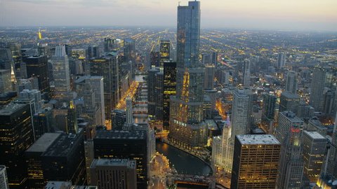 Chicago, USA - September 2016: Aerial sunset illuminated view of Trump Tower Chicago River Illinois Metropolitan skyline Skyscraper buildings in Downtown Business and Financial District USA aa