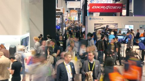 LAS VEGAS - January 7, 2017: Crowds of people at CES 2017 expo. CES is the world's leading consumer electronics trade show. 4K UHD timelapse.