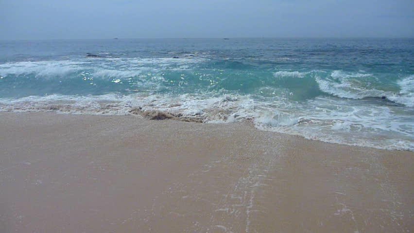 Water crashes at beach in Cabo San Lucas, Mexico.
