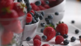 Berries falling into bowl in super slow motion, shot on Phantom Flex 4K - Powered by Shutterstock - Get 15% off with code: PIKWIZARD15
