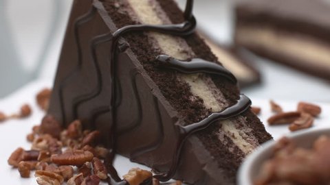 Pouring chocolate onto cake in super slow motion, shot on Phantom Flex 4K