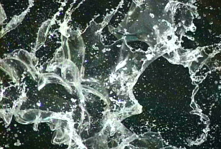 Background texture 8 of 8, water falling on black background..