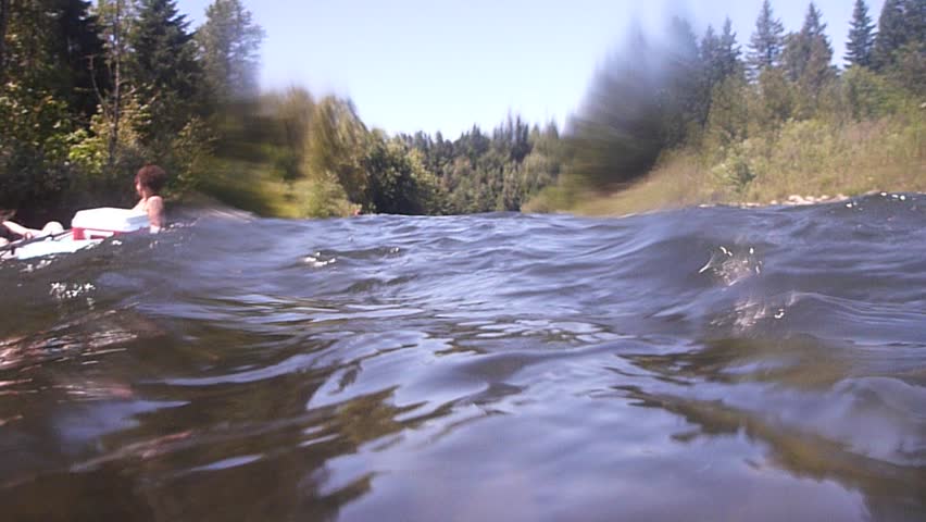 Floating Clackamas River in Oregon during the summer.