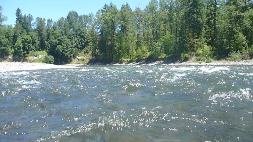 Floating Clackamas River in Oregon during the summer.