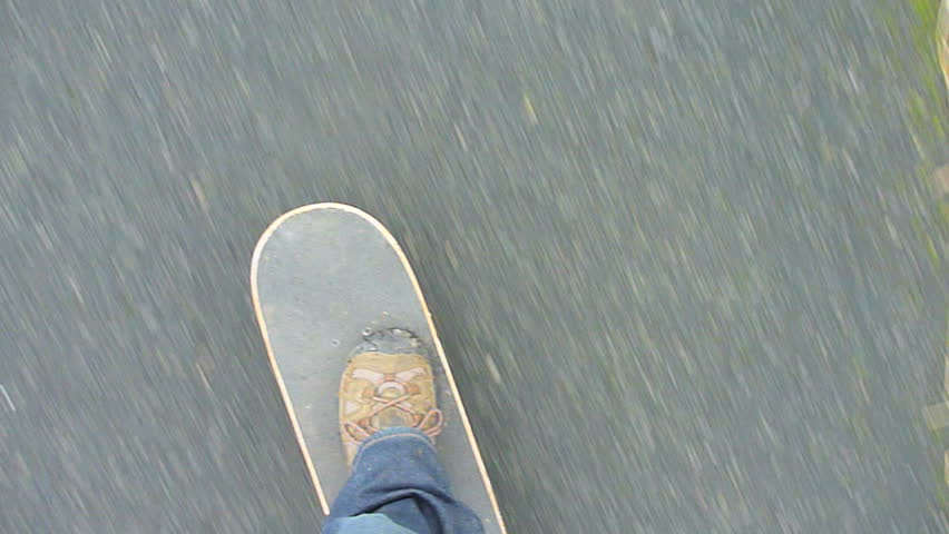 Skateboarding on road point of view with sound.