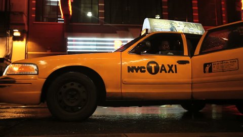 New York - Circa 2009: New York City in 2009. A person getting into a taxi cab in New York City, New York.
