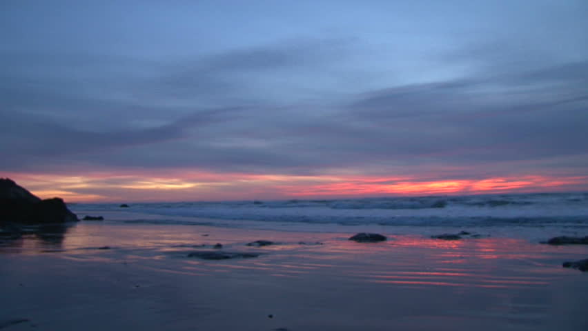 Oregon's Pacific Coast and a cloudy sunset at the beach, time lapse.