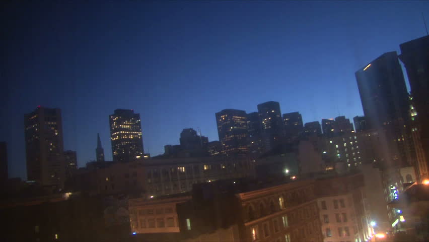 Downtown San Francisco, California buildings cityscape time lapse with sunrise