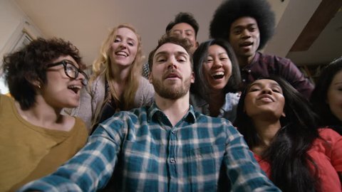 4K Happy student friends in shared accommodation pose for selfie Dec 2016-UK