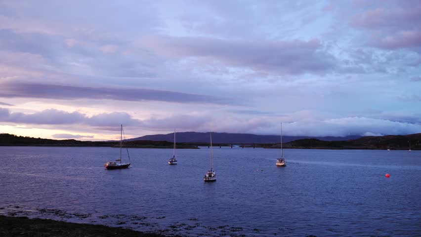 Small boats at Kyle Akin during sunset time in late summer, Kyle of Lochalsh, Isle of Skye, Highland Region, Scotland, United Kingdom
