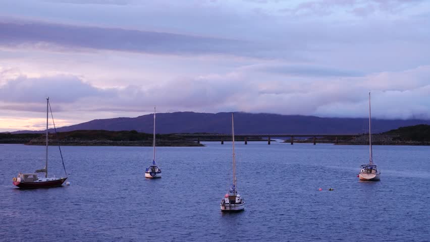 Small boats at Kyle Akin during sunset time in late summer, Kyle of Lochalsh, Isle of Skye, Highland Region, Scotland, United Kingdom
