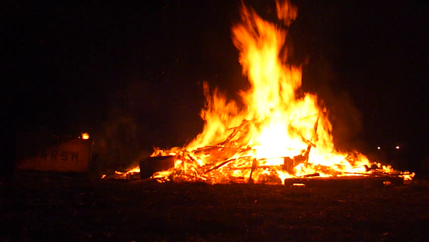 Large fire burning at night.