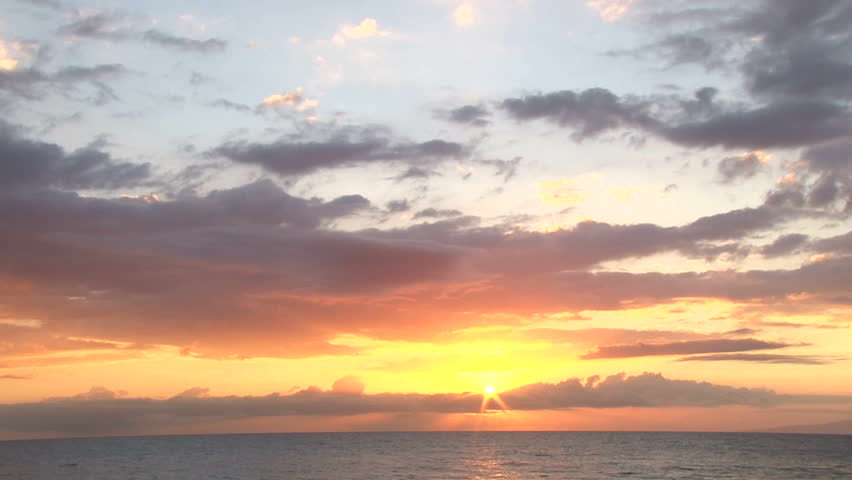 Real time scenic during sunset over the Pacific Ocean off the shores of Maui,
