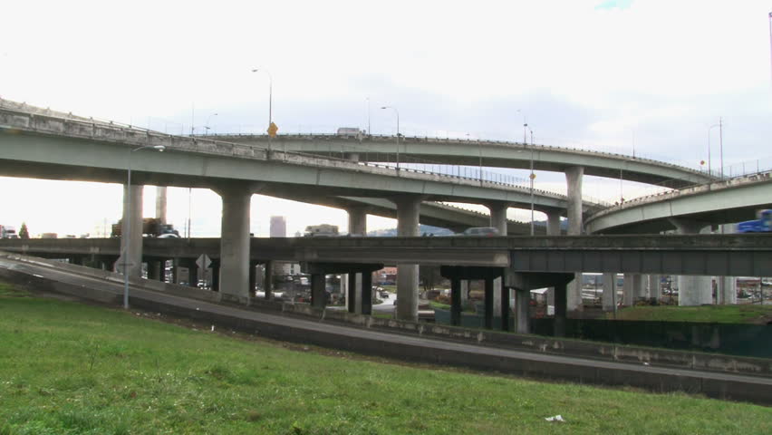 Time lapse of traffic in Portland, Oregon over freeway overpass.