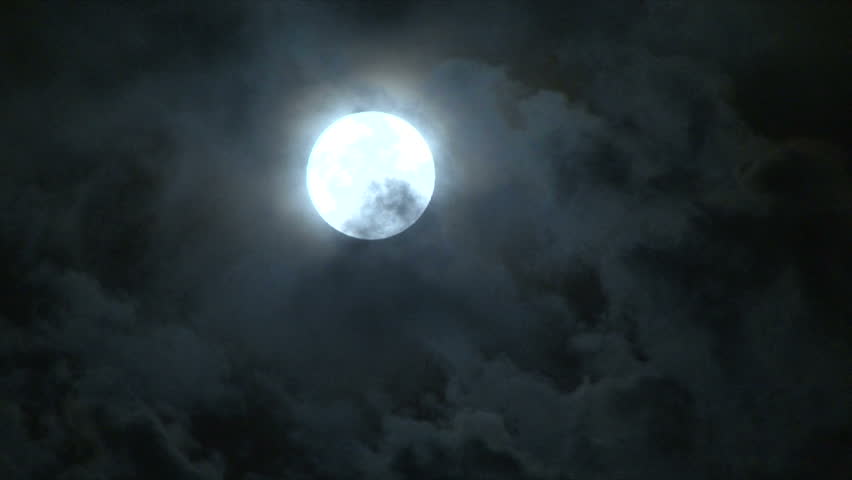 Bright full moon on partly cloudy night. 1920 x1020 Full HD.