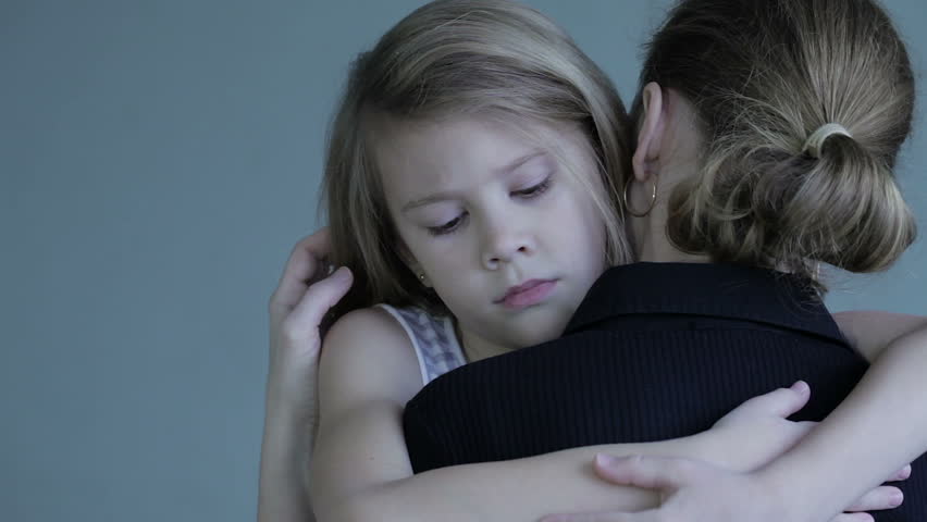 Sad daughter hugging his mother at home. Concept of couple family is in sorrow. | Shutterstock HD Video #23039968