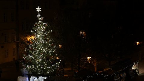 PRAGUE, CZECH REPUBLIC - DECEMBER 2016: Czechia capital streets and town square by night before Christmas occupied by tourists